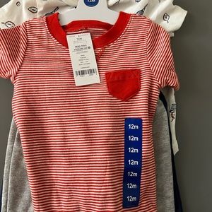 4-piece set for boys from Carter’s Baby. Two onesies and Two pants, Size 12m